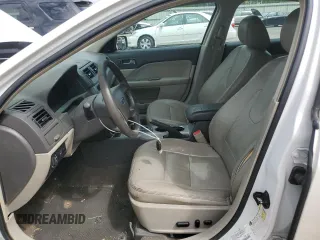 2012 Ford Fusion Hybrid с VIN 3FADP0L35CR184476, выставлен на аукционе Copart как лот 63907885 с пробегом 230 589 миль миль и Списание • Salvage title. История ставок и продаж доступна на DreamBid. Изображение 7.