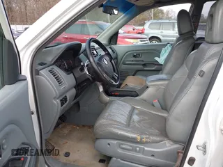 2005 Honda Pilot EX-L z VIN 5FNYF18555B020678, wystawiony jako IAAI lot #41474519 z przebiegiem 250 064 mil mil oraz . Historia ofert i sprzedaży dostępna na DreamBid. Obrazek 5.