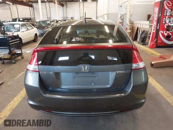 2010 Honda Insight LX with VIN JHMZE2H54AS040316, listed as a IAAI auction lot 41572246 with 142,850 mi miles and . Bid and sale history available at DreamBid. Image 16.