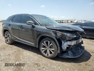 2021 Lexus RX 350 with VIN 2T2HZMAA1MC188316, listed as a Copart auction lot 56005935 with 64,537 mi miles and Salvage title. Bid and sale history available at DreamBid. Image 4.
