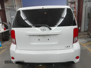 2014 Scion xB with VIN JTLZE4FE1EJ060281, listed as a IAAI auction lot 41477386 with 61,423 mi miles. Bid and sale history available at carsss.com. Image 16.