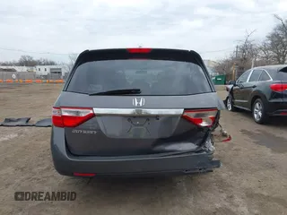 2012 Honda Odyssey EX-L with VIN 5FNRL5H65CB042898, listed as a IAAI auction lot 41784075 with 179,596 mi miles and . Bid and sale history available at carsss.com. Image 16.