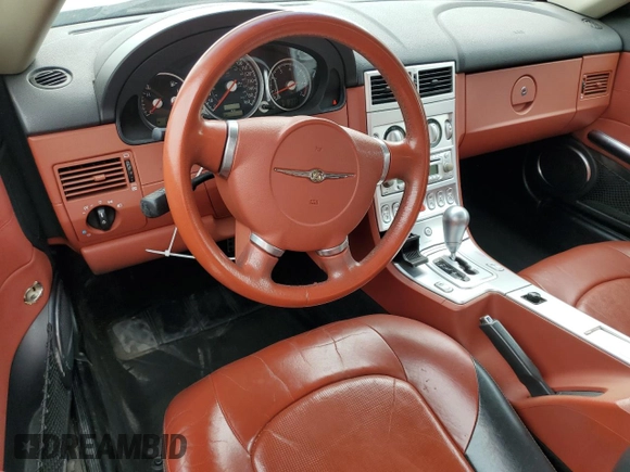 2005 Chrysler Crossfire Limited z VIN 1C3AN69L95X029893, wystawiony jako Copart lot #51960915 z przebiegiem 93 736 mil mil oraz Nie do naprawy. Historia ofert i sprzedaży dostępna na DreamBid. Obrazek 8.