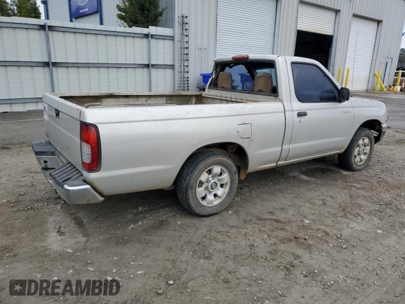 1998 Nissan Frontier XE with VIN 1N6DD21S3WC381722, listed as a Copart auction lot 86492454 with Not provided miles and Salvage title. Bid and sale history available at DreamBid. Image 3.