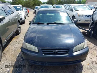2000 Toyota Camry CE z VIN 4T1BG22K1YU663544, wystawiony jako IAAI lot #42252413 z przebiegiem 338 875 mil mil oraz . Historia ofert i sprzedaży dostępna na DreamBid. Obrazek 13.