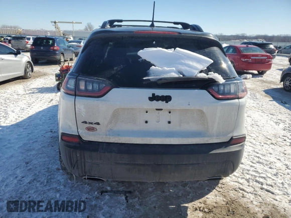 2020 Jeep Cherokee Altitude with VIN 1C4PJMLX9LD511845, listed as a Copart auction lot 46396405 with 122,338 mi miles and Salvage Title. Bid and sale history available at DreamBid. Image 6.