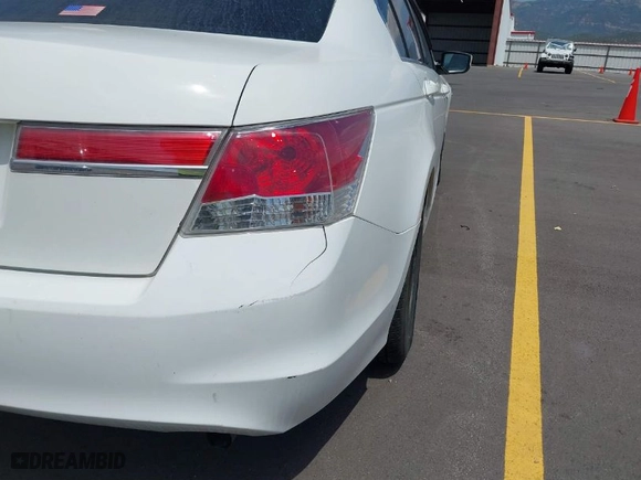 2011 Honda Accord Sdn LX with VIN 1HGCP2F34BA033779, listed as a IAAI auction lot 39770432 with 136,090 mi miles. Bid and sale history available at carsss.com. Image 14.