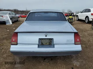 1988 Chevrolet Monte Carlo z VIN 1G1GZ11G5JP105897, wystawiony jako Copart lot #51135095 z przebiegiem 54 915 mil mil oraz Szkody całkowita. Historia ofert i sprzedaży dostępna na DreamBid. Obrazek 6.
