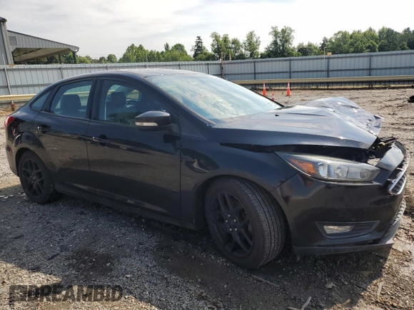 2016 Ford Focus SE with VIN 1FADP3F21GL228871, listed as a Copart auction lot 63506525 with 62,756 mi miles and Salvage title. Bid and sale history available at DreamBid. Image 4.