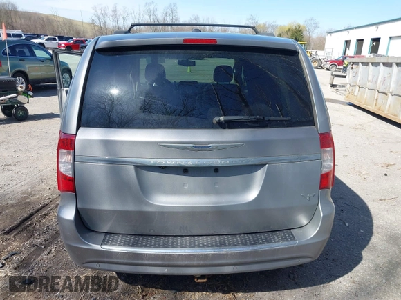 2013 Chrysler Town & Country Touring L with VIN 2C4RC1CG6DR660858, listed as a IAAI auction lot 41970976 with 140,299 mi miles and . Bid and sale history available at DreamBid. Image 16.