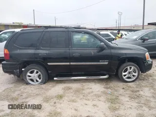 2006 GMC Envoy SLT with VIN 1GKDS13S462241866, listed as a IAAI auction lot 41943322 with 90,695 mi miles. Bid and sale history available at carsss.com. Image 13.