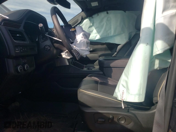 2023 Chevrolet Suburban Premier with VIN 1GNSCFKD6PR101043, listed as a Copart auction lot 43536655 with 39,827 mi miles and Salvage title. Bid and sale history available at DreamBid. Image 7.