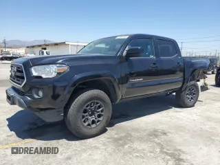 2019 Toyota Tacoma SR5 with VIN 3TMAZ5CN7KM111255, listed as a Copart auction lot 63309745 with 61,728 mi miles and Salvage title. Bid and sale history available at DreamBid. Image 1.