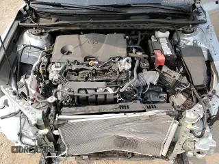 2024 Toyota Camry LE z VIN 4T1C11AK6RU190646, wystawiony jako Copart lot #58817045 z przebiegiem 19 276 mil mil oraz Szkoda całkowita • Salvage title. Historia ofert i sprzedaży dostępna na DreamBid. Obrazek 11.