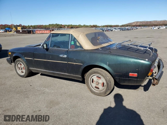 1979 FIAT 124 Spider z VIN 124CS20151060, wystawiony jako Copart lot #78019714 z przebiegiem 95 504 mil mil oraz Czysty tytuł • Clean title. Historia ofert i sprzedaży dostępna na DreamBid. Obrazek 2.
