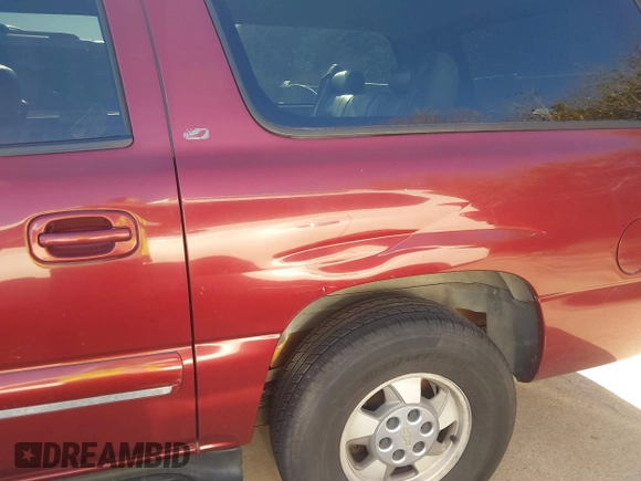2002 Chevrolet Suburban LT with VIN 1GNEC16Z02J229078, listed as a IAAI auction lot 41737482 with 306,502 mi miles and . Bid and sale history available at DreamBid. Image 12.