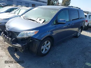 2015 Toyota Sienna LE AAS with VIN 5TDKK3DC7FS649602, listed as a IAAI auction lot 42152836 with 70,892 mi miles and . Bid and sale history available at DreamBid. Image 2.