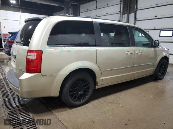 2010 Dodge Grand Caravan Crew with VIN 2D4RN6DX7AR463122, listed as a Copart auction lot 48768635 with 102,497 mi miles and Salvage Title. Bid and sale history available at DreamBid. Image 3.