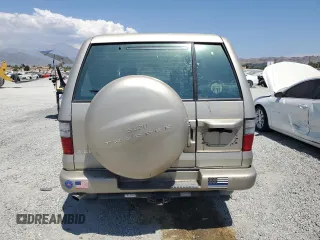 2002 Isuzu Trooper S z VIN JACDS58X527J08603, wystawiony jako Copart lot #63357674 z przebiegiem 218 282 mil mil oraz Szkody całkowita. Historia ofert i sprzedaży dostępna na DreamBid. Obrazek 6.