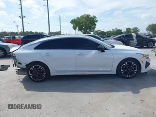 2022 Kia K5 GT-Line z VIN 5XXG64J24NG114772, wystawiony jako IAAI lot #42161747 z przebiegiem 60 761 mil mil oraz . Historia ofert i sprzedaży dostępna na DreamBid. Obrazek 14.