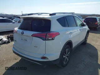 2018 Toyota RAV4 XLE with VIN JTMWFREV7JJ728184, listed as a IAAI auction lot 41377413 with 117,957 mi miles. Bid and sale history available at carsss.com. Image 4.