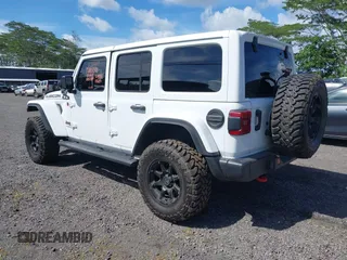 2022 Jeep Wrangler Unlimited Rubicon with VIN 1C4HJXFG8NW130156, listed as a IAAI auction lot 42004630 with 129,313 mi miles and . Bid and sale history available at DreamBid. Image 3.
