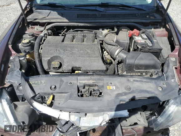 2009 Lincoln MKS z VIN 1LNHM94R89G601127, wystawiony jako Copart lot #60551075 z przebiegiem 102 000 mil mil oraz Szkoda całkowita • Salvage title. Historia ofert i sprzedaży dostępna na DreamBid. Obrazek 11.