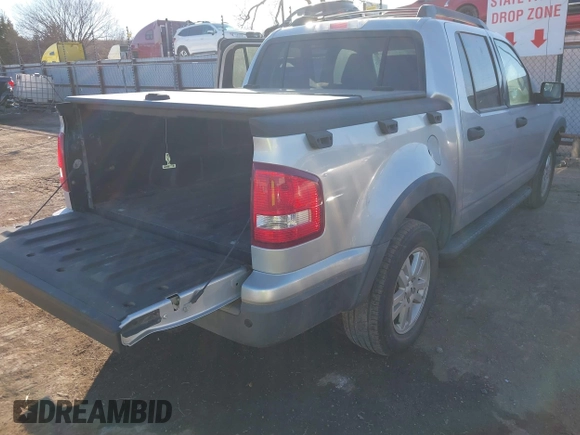 2010 Ford Explorer Sport Trac XLT z VIN 1FMEU3BE6AUF01646, wystawiony jako IAAI lot #41646440 z przebiegiem 58 473 mil mil oraz . Historia ofert i sprzedaży dostępna na DreamBid. Obrazek 4.