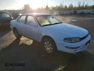 1994 Toyota Camry LE z VIN 4T1GK12E6RU003154, wystawiony jako Copart lot #41506975 z przebiegiem 142 037 mil mil oraz Szkoda całkowita • Salvage title. Historia ofert i sprzedaży dostępna na DreamBid. Obrazek 4.
