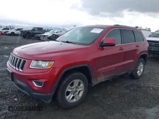 2014 Jeep Grand Cherokee Laredo with VIN 1C4RJFAG7EC213469, listed as a IAAI auction lot 41825075 with 163,417 mi miles. Bid and sale history available at carsss.com. Image 2.