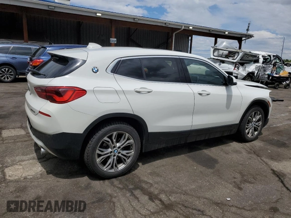2018 BMW X2 xDrive28i z VIN WBXYJ5C38JEF79686, wystawiony jako Copart lot #56988735 z przebiegiem 103 799 mil mil oraz Szkoda całkowita • Salvage title. Historia ofert i sprzedaży dostępna na DreamBid. Obrazek 3.