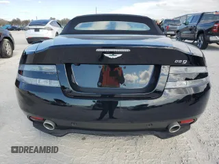 2015 Aston Martin DB9 z VIN SCFFDAFM3FGB16585, wystawiony jako Copart lot #76159354 z przebiegiem Nie podano mil oraz Szkody całkowita. Historia ofert i sprzedaży dostępna na DreamBid. Obrazek 6.