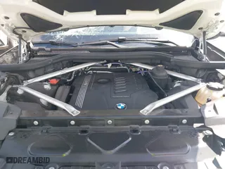 2021 BMW X7 xDrive40i with VIN 5UXCW2C03M9F63758, listed as a IAAI auction lot 41708939 with 57,872 mi miles. Bid and sale history available at carsss.com. Image 10.