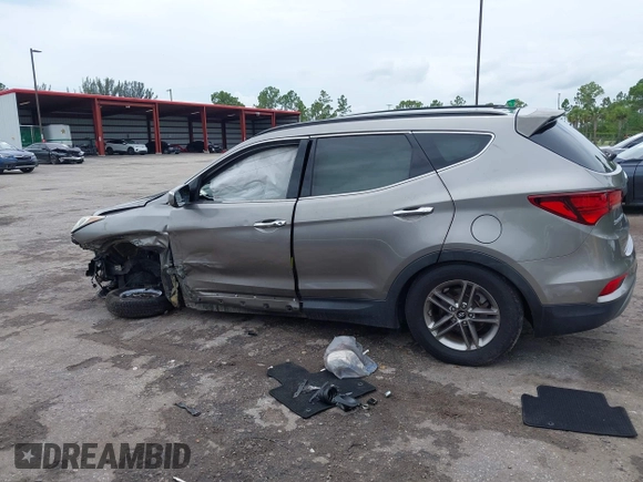 2017 Hyundai Santa Fe 2.4L with VIN 5NMZU3LB2HH014844, listed as a IAAI auction lot 42657624 with 93,533 mi miles and . Bid and sale history available at DreamBid. Image 15.