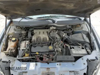 2000 Ford Taurus SE z VIN 1FAFP53U5YA259273, wystawiony jako Copart lot #52787305 z przebiegiem 234 848 mil mil oraz Szkoda całkowita • Salvage title. Historia ofert i sprzedaży dostępna na DreamBid. Obrazek 12.