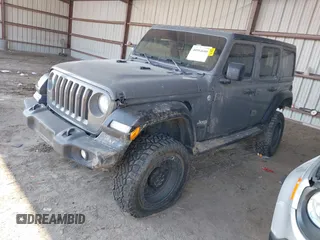 2020 Jeep Wrangler Unlimited Sport S с VIN 1C4HJXDG1LW189100, выставлен на аукционе IAAI как лот 40994680 с пробегом 172 039 миль миль и . История ставок и продаж доступна на DreamBid. Изображение 18.