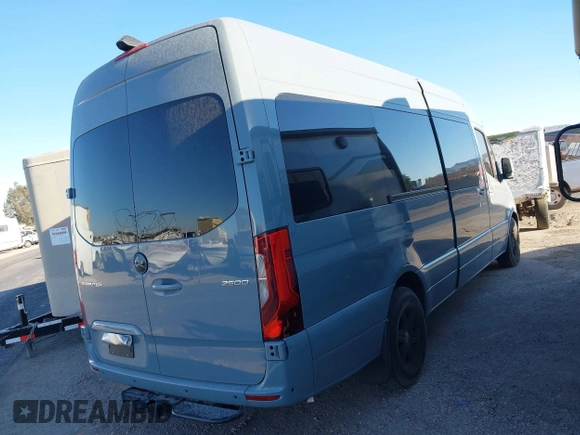 2021 Mercedes-Benz Sprinter Cargo with VIN W1W4ECHY5MT075011, listed as a IAAI auction lot 41364920 with 22,421 mi miles and . Bid and sale history available at carsss.com. Image 4.