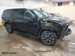 2021 Chevrolet Suburban RST with VIN 1GNSKEKD2MR298916, listed as a Copart auction lot 79096704 with 87,448 mi miles and Salvage Title. Bid and sale history available at carsss.com. Image 4.