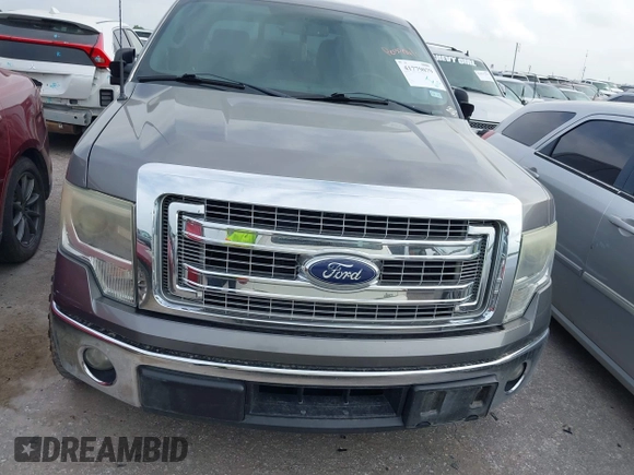 2014 Ford F-150 XL with VIN 1FTFW1CT5EKF90924, listed as a IAAI auction lot 41779079 with 250,591 mi miles. Bid and sale history available at carsss.com. Image 12.