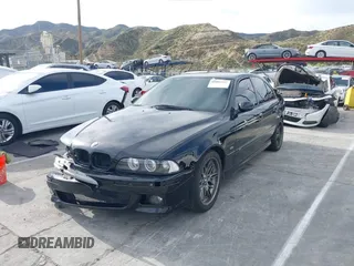 2001 BMW M5 z VIN WBSDE93421BZ99483, wystawiony jako IAAI lot #41892842 z przebiegiem 134 689 mil mil oraz . Historia ofert i sprzedaży dostępna na DreamBid. Obrazek 21.