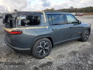 2023 Rivian R1S Launch Edition z VIN 7PDSGABL9PN022280, wystawiony jako Copart lot #83526124 z przebiegiem 51 mil mil oraz Szkoda całkowita • Salvage title. Historia ofert i sprzedaży dostępna na DreamBid. Obrazek 3.