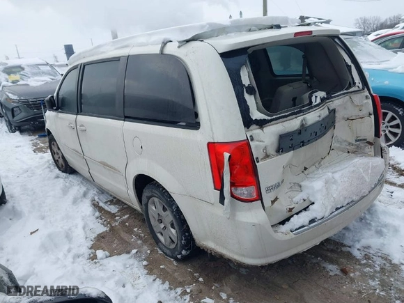 2012 Dodge Grand Caravan SE with VIN 2C4RDGBG2CR419489, listed as a IAAI auction lot 41270114 with 124,869 mi miles. Bid and sale history available at carsss.com. Image 3.