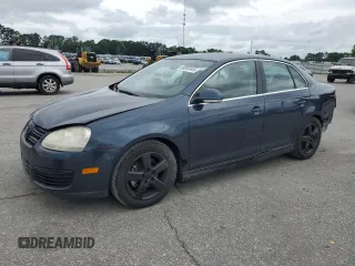 2009 Volkswagen Jetta SE with VIN 3VWRZ71K59M055735, listed as a Copart auction lot 60202485 with 160,196 mi miles and Salvage title. Bid and sale history available at DreamBid. Image 1.