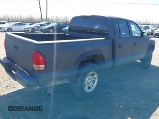 2004 Dodge Dakota Sport with VIN 1D7HG38K84S608161, listed as a IAAI auction lot 41863394 with 145,288 mi miles and . Bid and sale history available at DreamBid. Image 4.