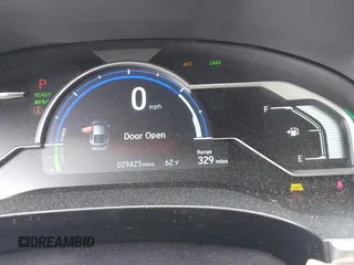 2018 Honda Clarity z VIN JHMZC5F12JC021958, wystawiony jako IAAI lot #42191071 z przebiegiem 29 423 mil mil oraz . Historia ofert i sprzedaży dostępna na DreamBid. Obrazek 7.