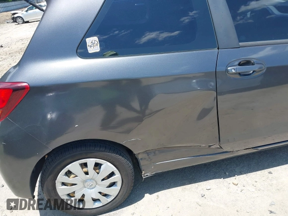 2015 Toyota Yaris L with VIN VNKJTUD35FA054329, listed as a IAAI auction lot 42289132 with 122,257 mi miles and . Bid and sale history available at DreamBid. Image 6.