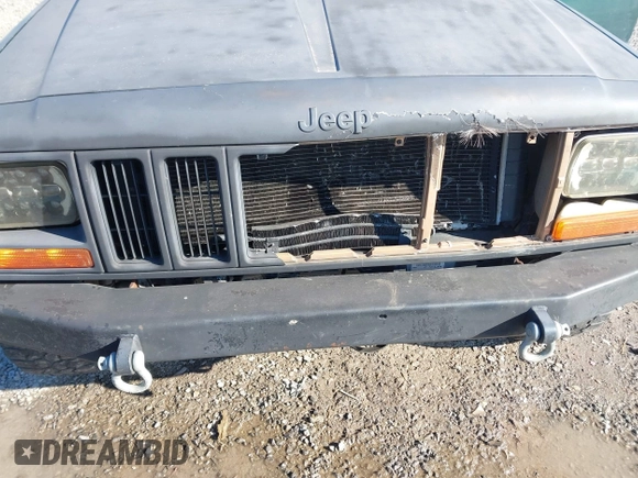 2001 Jeep Cherokee Sport with VIN 1J4FF58S41L619254, listed as a IAAI auction lot 41596384 with 180,826 mi miles and . Bid and sale history available at DreamBid. Image 6.