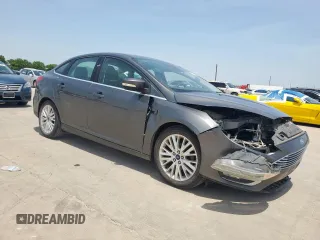 2017 Ford Focus Titanium with VIN 1FADP3J20HL253446, listed as a Copart auction lot 64196895 with 150,633 mi miles and Salvage title. Bid and sale history available at DreamBid. Image 4.