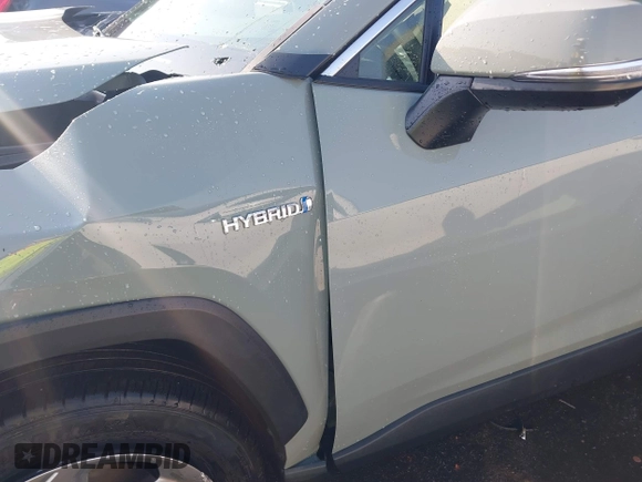 2021 Toyota RAV4 Hybrid LE with VIN JTMB6RFV3MD038562, listed as a IAAI auction lot 42576852 with 27,463 mi miles and . Bid and sale history available at DreamBid. Image 16.