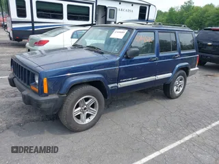 2001 Jeep Cherokee Sport with VIN 1J4FT48S01L604740, listed as a IAAI auction lot 42440685 with 198,284 mi miles and . Bid and sale history available at DreamBid. Image 2.